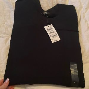 Patterned black sweater.  New with tags